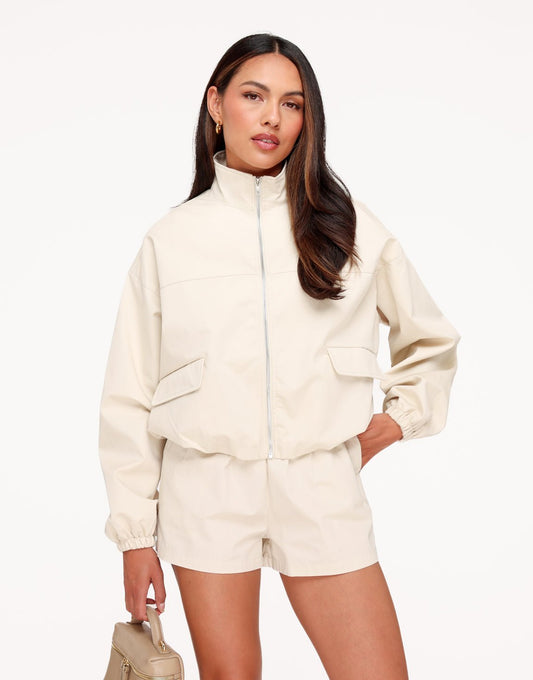 Beige Puffy Elastische Onderkant - Jas - Olivia & Kate