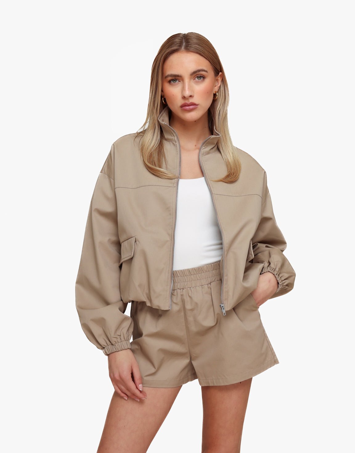 Donker Taupe Puffy Elastische Onderkant - Jas - Olivia & Kate