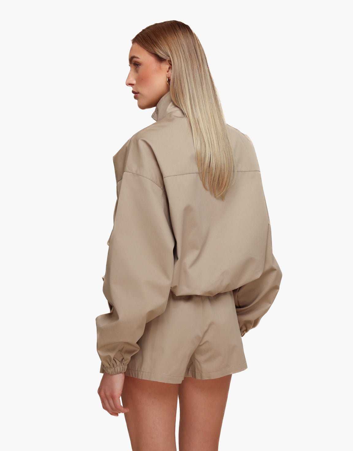 Donker Taupe Puffy Elastische Onderkant - Jas - Olivia & Kate