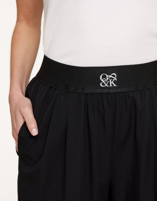 Zwarte O&K Elastische Wijde Pijpen - Broek - Olivia & Kate